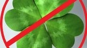4 leaf clover with a red line across it. 